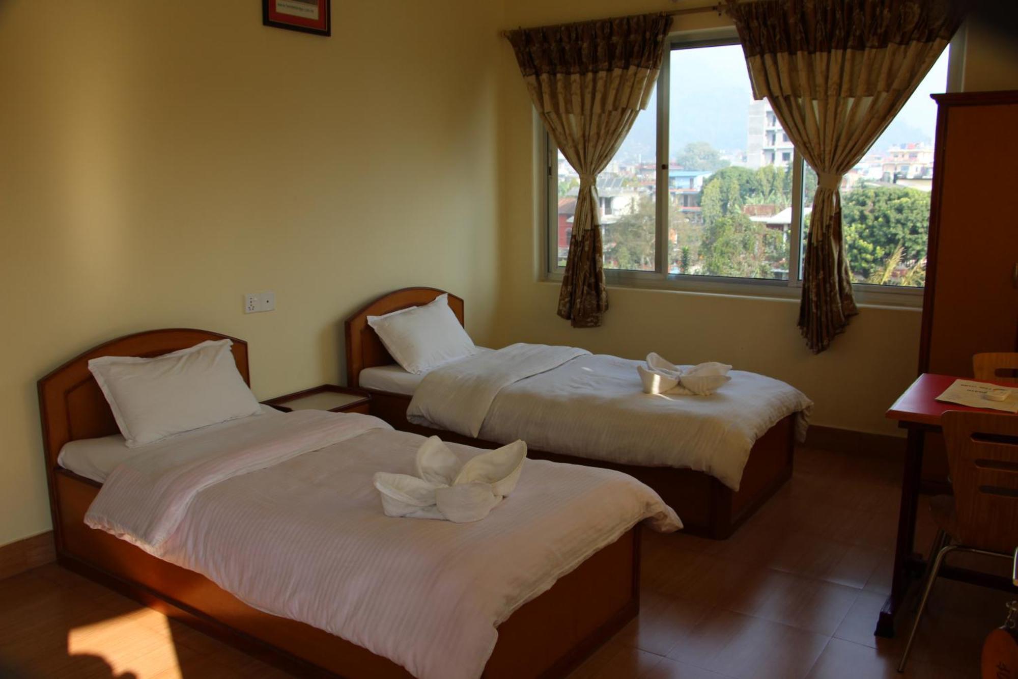 Hotel Milarepa Pvt Ltd Pokhara Quarto foto